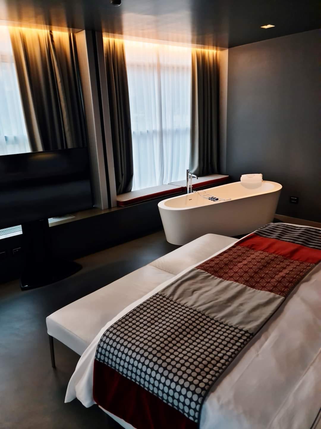Bedroom with freestanding bath