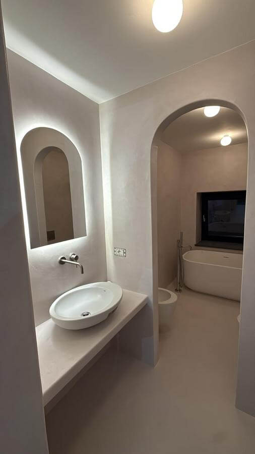 Bathroom with black bath